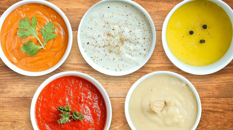 Five mother sauces in bowls