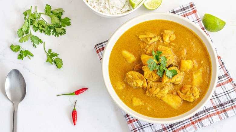 bowl of yellow curried chicken