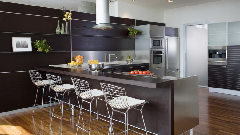 A kitchen with stainless steel finishes