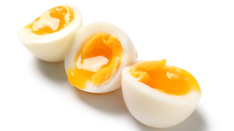 Halved soft-boiled eggs