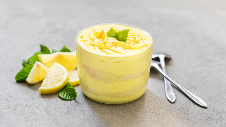 A glass filled with lemon tiramisu