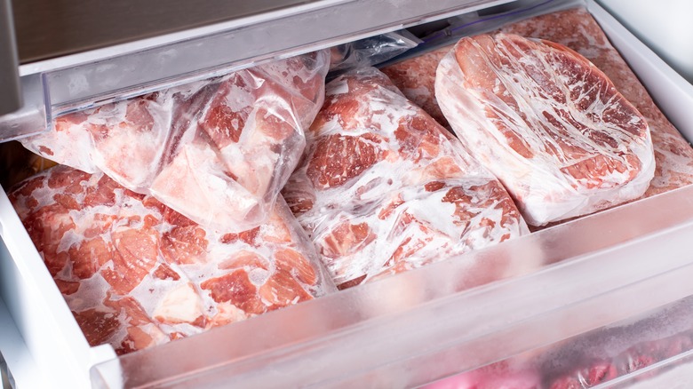 frozen meat stored in a freezer