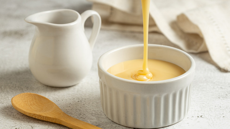 Sweetened condensed milk poured into a ramekin