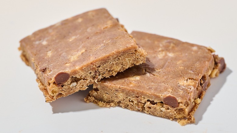 Protein bar cut in half on a table