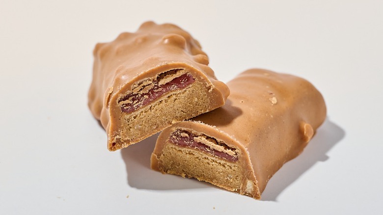 Protein bar cut in half on a table