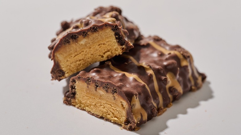 Protein bar cut in half on a table
