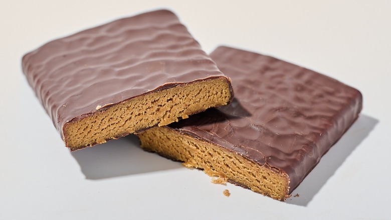 Protein bar cut in half on a table