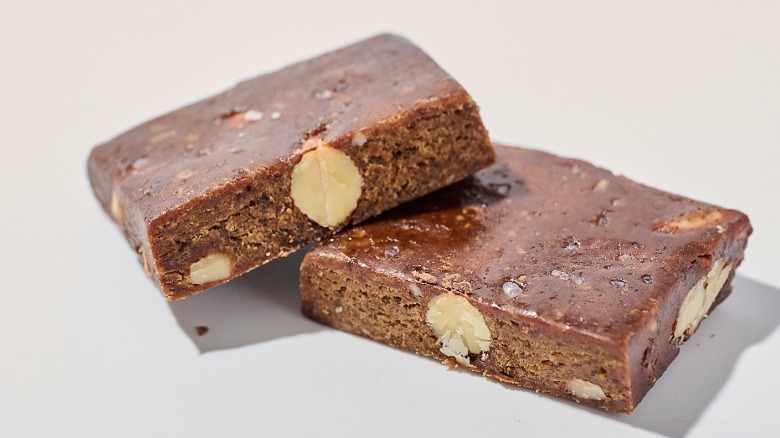 Protein bar cut in half on a table