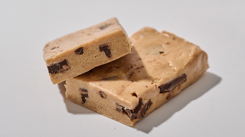Protein bar cut in half on a table
