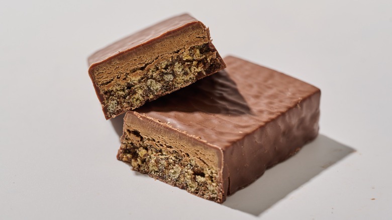 Protein bar cut in half on a table