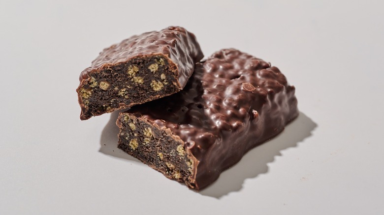 Protein bar cut in half on a table