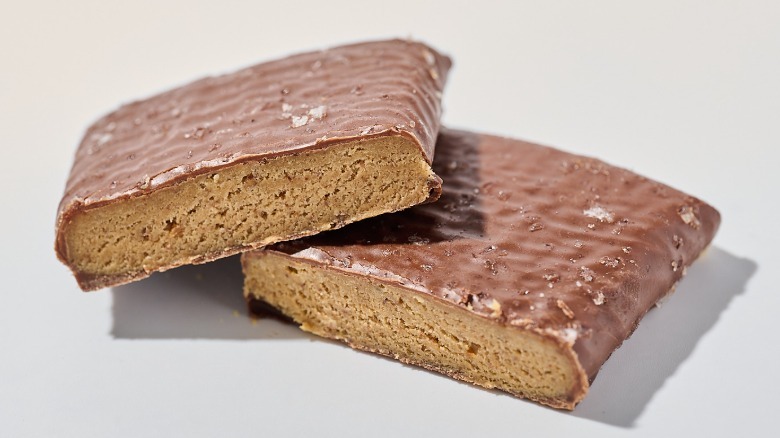Protein bar cut in half on a table