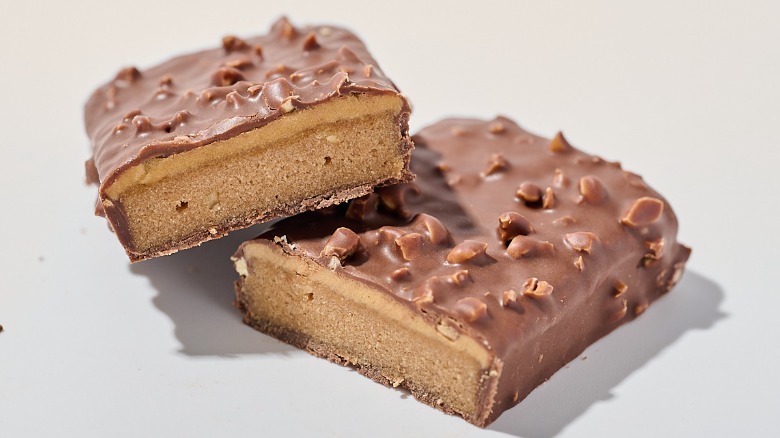 Protein bar cut in half on a table